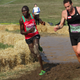 Kenyan Geoffrey Kamworor with about 1000 meters to go. Right is a lapped runner. Photo: Lone Dybdal